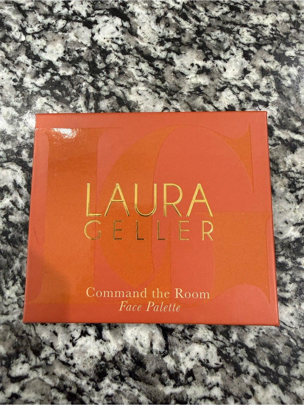 Laura Geller Face Palette in Bright Orange with Gold Logo